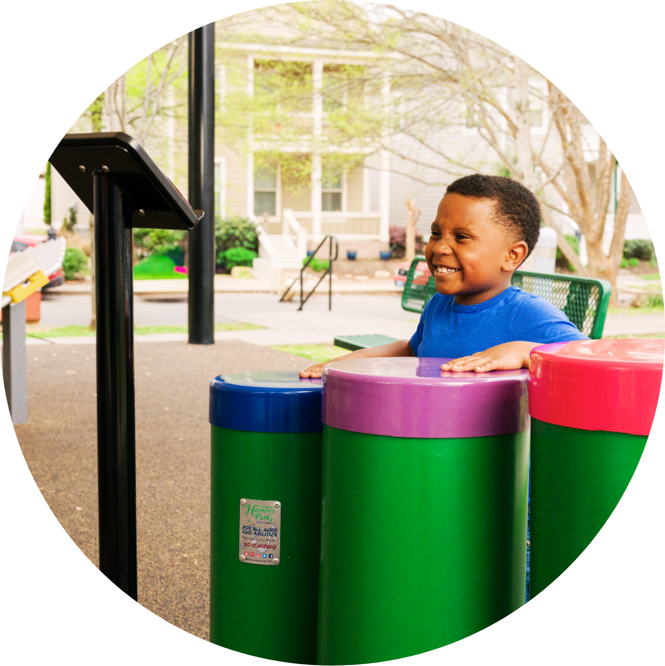 Little boy playing drums using The Harmony Method
